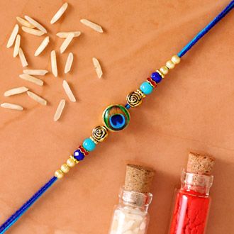 Circular Peacock Feather Rakhi