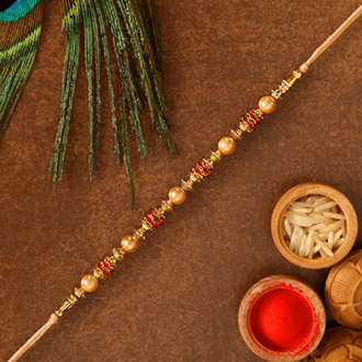 Traditional Golden Pearl Rakhi - Singapore