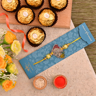 Divine Bal Ganesha Kids Rakhi And 3 Pcs Ferrero Rocher