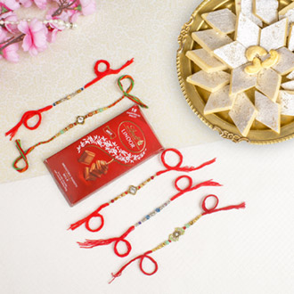 Fascinating Five Set of Rakhis with Kaju Katli & Lindt Chocolate For UK