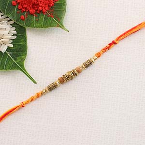Metal Beads Brass Rakhi to UK