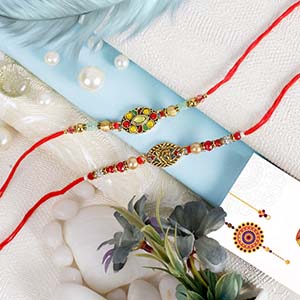 IK Onkar Oval Rakhi Set - Navratna Rakhi to UK