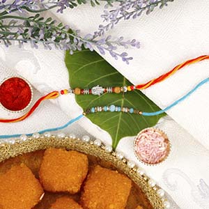 Amazing Two Rakhi Set with Sweet - Rakhi with Cookies to UK