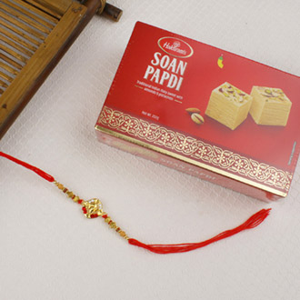 Ethnic God Ganesha Rakhi with Sweet For UK