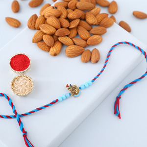 Sneh Blue Krishna Rakhi with Almonds