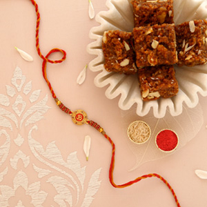 Sneh Traditional Om Rakhi with Dodha Burfi