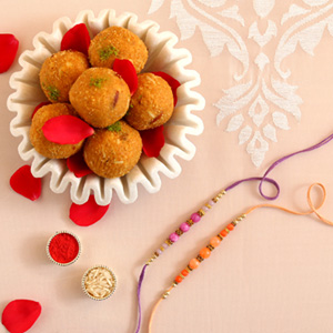 Sneh Peachy Rakhi Set with 500 Grams Besan Ladoo