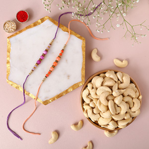 Sneh Peachy Rakhi Set with 250 Grams Cashew