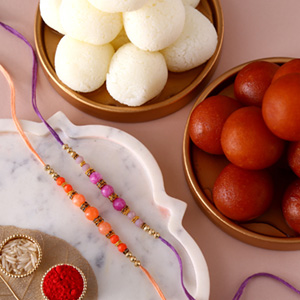 Sneh Peachy Rakhi Set with 1 Kg Gulab Jamun and 1 Kg Rasgulla Tin
