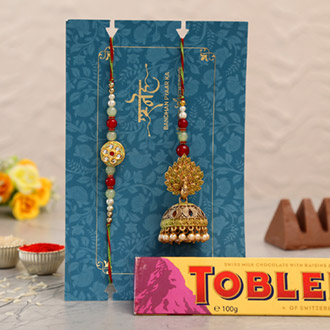 Dancing Peacock Jhumki Lumba Rakhi Set With Toblerone Chocolate