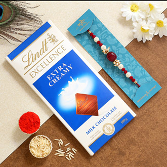 Red Beads Pearl Designer Rakhi And Lindt - Dubai