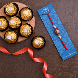 Japanese Red Stone Rakhi And 3 Pcs Ferrero Rocher
