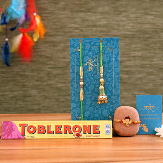 Green Lumba Rakhi Set & Kids Rakhi With Toblerone