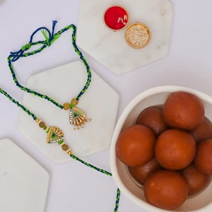 Peacock Rakhi Set with Gulab Jamun