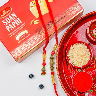 Bhaiya Bhabhi Set Of 2 Rakhis With Soan Papdi & Ganesha Thali