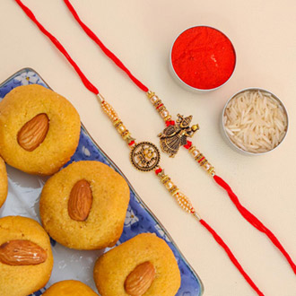 Trishul & Radha Krishna Set of 2 Rakhis With Besan Laddoo