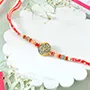 Grey and Golden Circular Rakhi