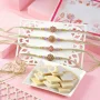 Four Rangoli Rakhi Gift Combo with Kaju Katli