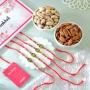 Pack of 4 Om Rakhis Gift Combo with Dryfruits
