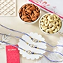 Elegant Evil Eye Rakhi Set with Dryfruits