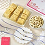 Elegant Evil Eye Rakhi Set with Soan Papdi & Cashew