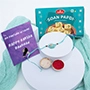 Alluring Blue Rakhi with Soan Papdi