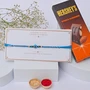 Minimal Evil Eye Rakhi with Hershey