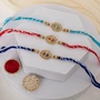 Premium Evil Eye Designer Rakhi Trio