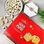 Fascinating Rakhi with 250 GM Soan Papdi and 50 GM Dry Fruit Cashews  - For Finland