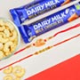 Big Brother & Rudraksh Combo Of 2 Rakhis With Dairy Milk & Dryfruits