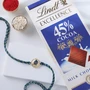FNP Peacock Rakhi With Lindt Excellence Milk Chocolate