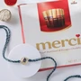FNP Peacock Rakhi With Merci Chocolate