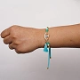 Elegant Blue Lumba Rakhi with Roli Chawal