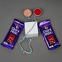 Traditional Multicolor Beaded Rakhi Gift Set with Dairy Milk Fruit & Nuts