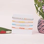 Set of 4 Designer Rakhi Combo for Brother with Roli and Chawal