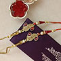 2 Sparkling Golden Rakhis