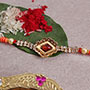 Beautiful Stone Studded Golden Rakhi