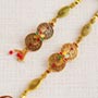 Enticing Golden Bhaiya Bhabhi Rakhi Set