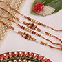 Eye-catchy auspicious set of 4 Rakhi