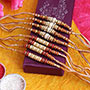 8 Rakhis with Traditional Touch