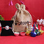 Silver Rakhi with Chocolate Potli