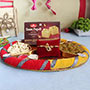Auspicious Rakhi with Tantalizing Delights