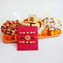 Majestic Golden Rakhis Hamper