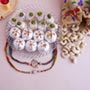 Designer Rakhis with Luscious Sweets Hamper