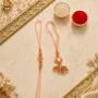 Elegant Peach Thread Bhaiya Bhabhi Lumba Rakhi Set