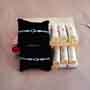 Two Evil Eye Rakhis with kaju Roll Sweets