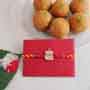 Silver Ganesha Rakhi with Besan Laddoo