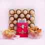 Two Auspicious Golden Rakhi with Sweets and Snacks