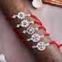 Five Silver Rakhi Set