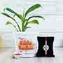 Designer Silver Rakhi with Peace Lily